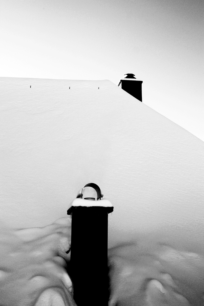 Black Chimneys in White Snow